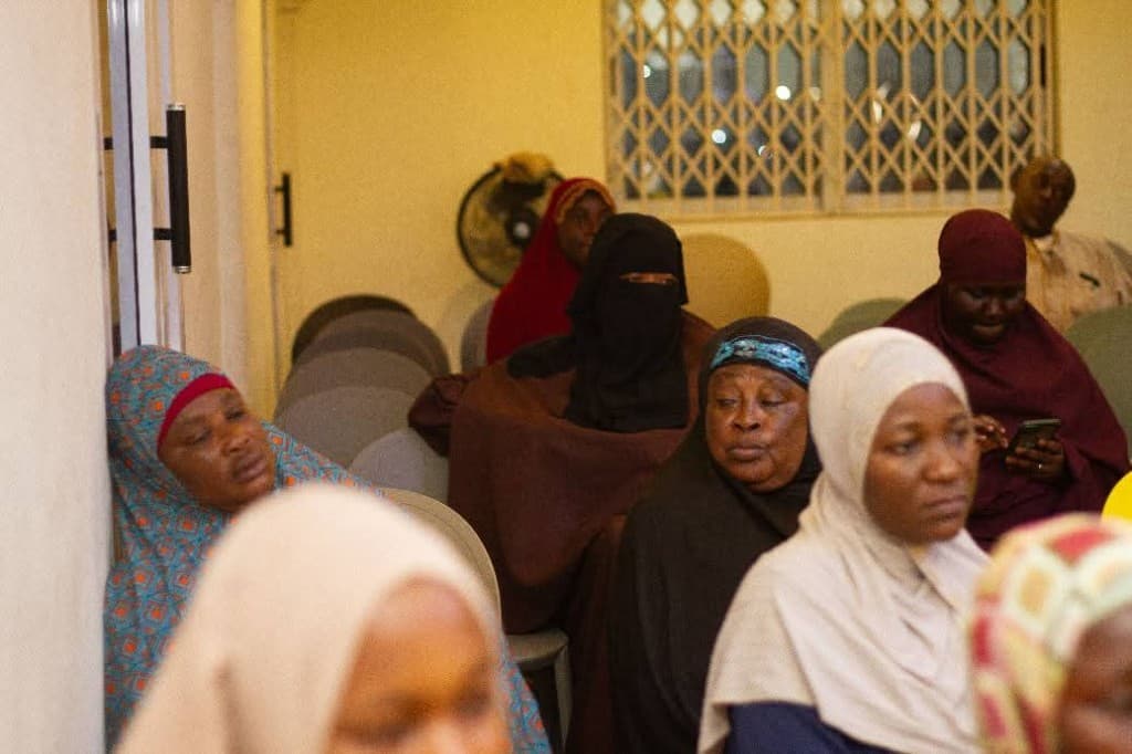 Women seated at a DATEX counselling and guidance program session