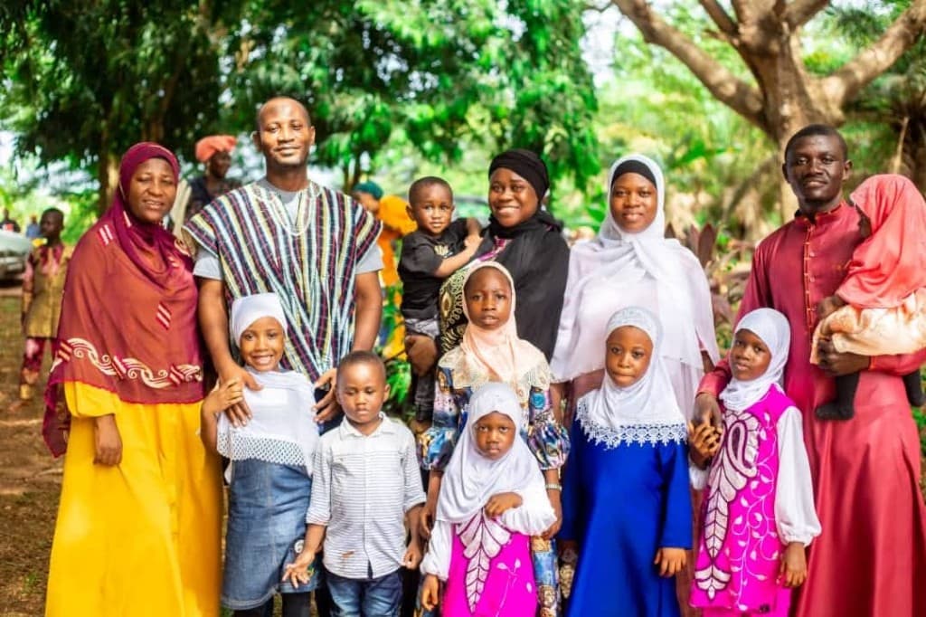 DATEX families posing together at a community event