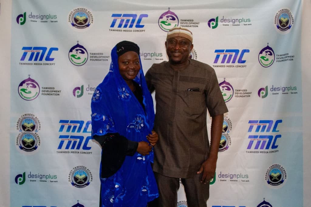 Community members posing at a Tawheed outreach and partnership event