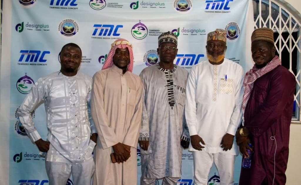Group photo of leaders at a Tawheed Development Foundation and Daarut-Tawheed Academy event